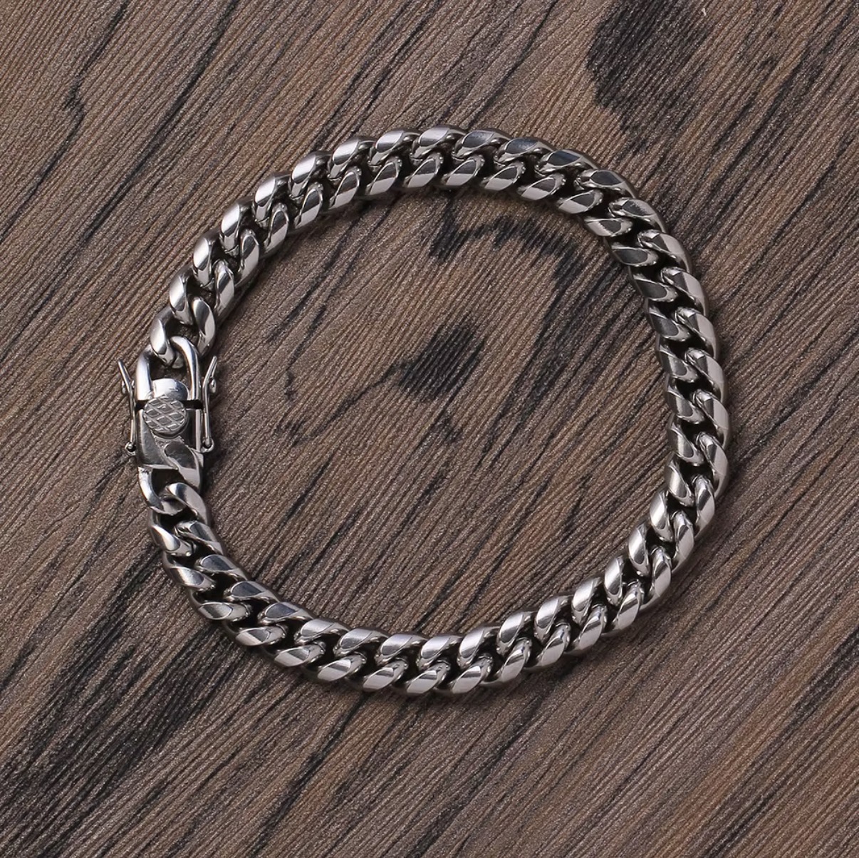 Photo from Maya F.'s order of SB003 Hip Hop 6mm stainless steel Cuban chain bracelet Gold plated jewelry men chunky Metal Hip Hop bracelets and bangles